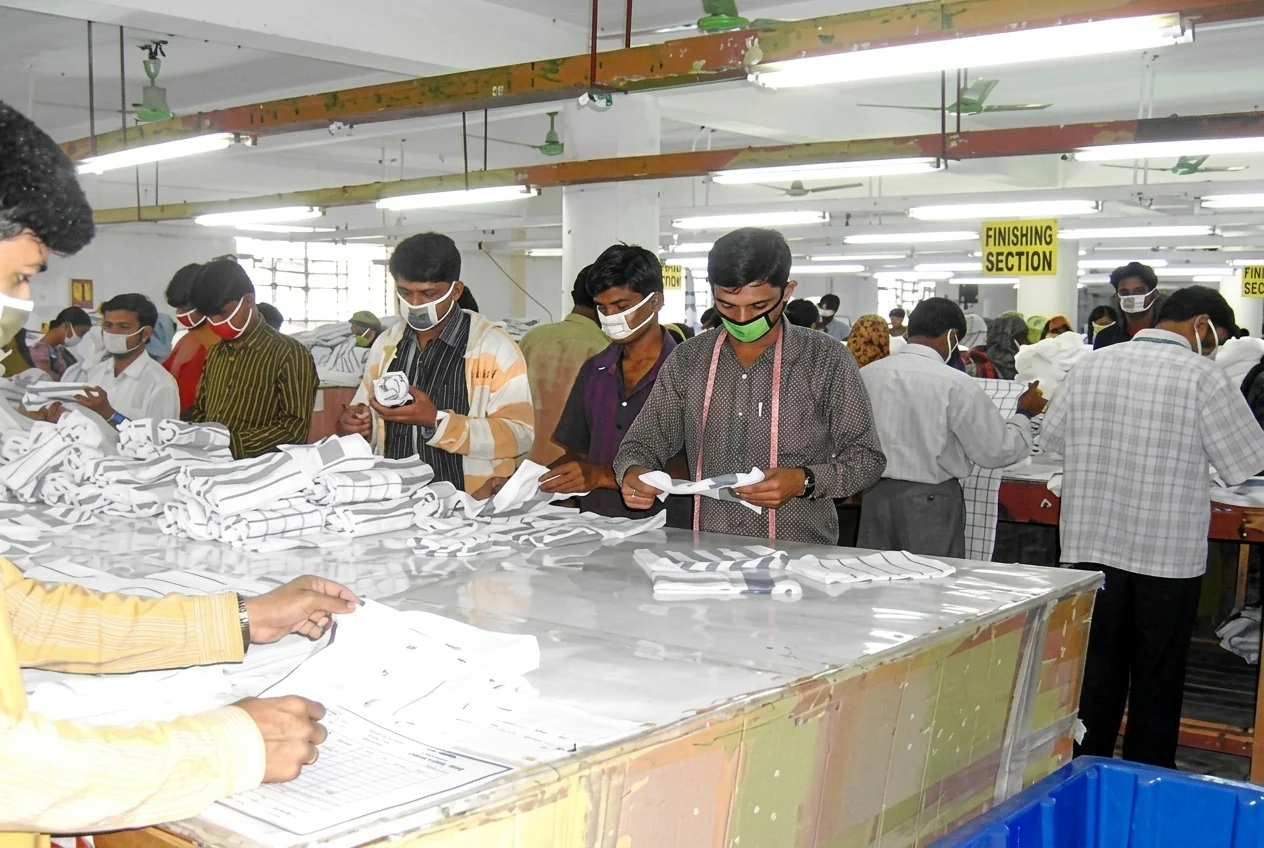 Cutting and finishing work at a textile production facility
